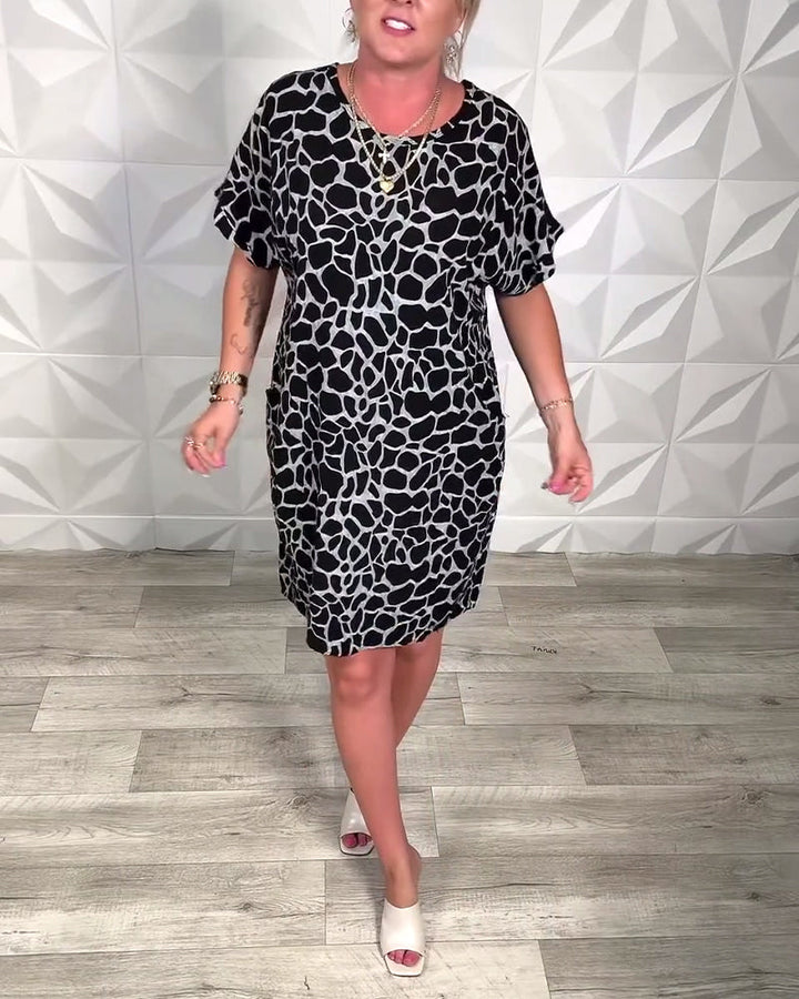 Tessa | Losvallende Midi-jurk
